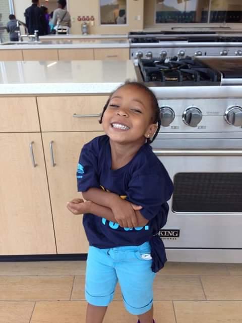 Happy child in the kitchen